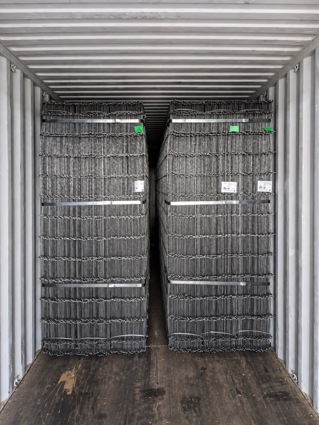Reinforcing mesh bundles inside shipping container