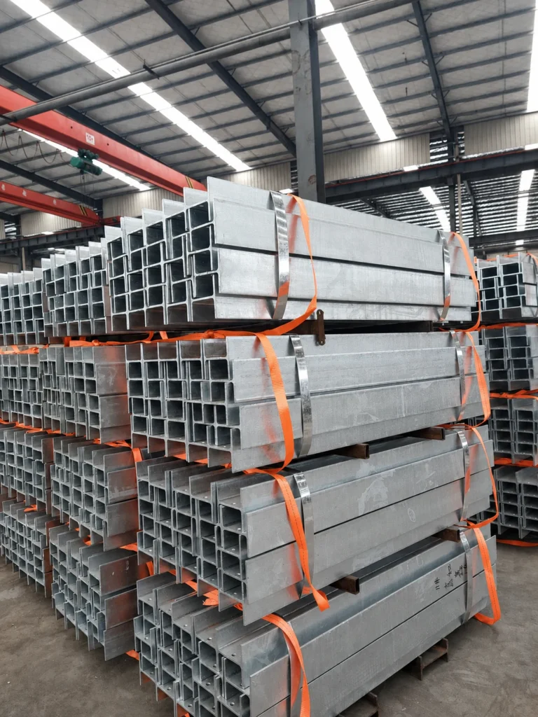 Galvanised steel posts bundled with orange straps